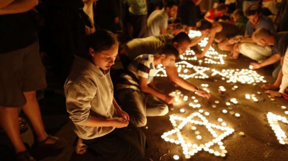Prayer sessions and vigils across Israel in memory of slain teens